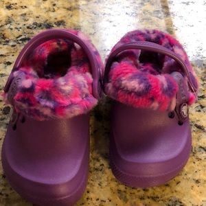 Purple and pink Crocs  size 6/7
